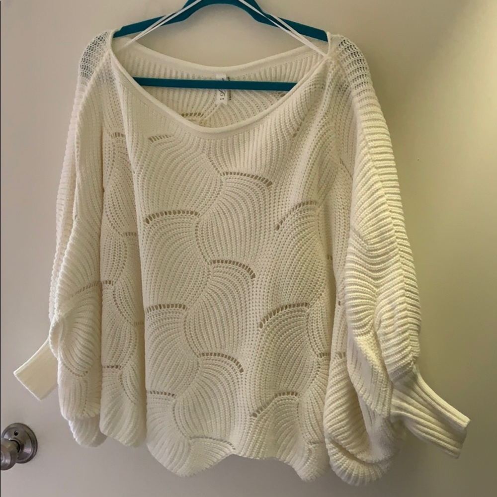 Loose scalloped sweater